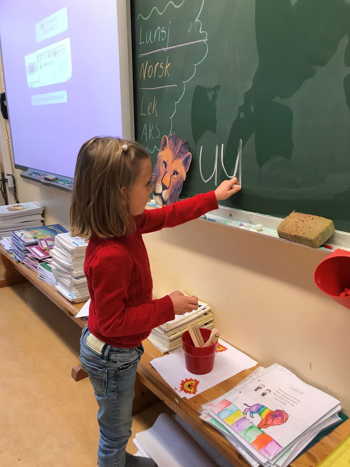 Elev skriver bokstaven u